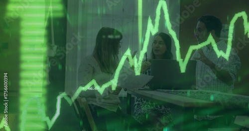 Business casual professionals reviewing stock chart overlay in meeting room, with laptop, documents