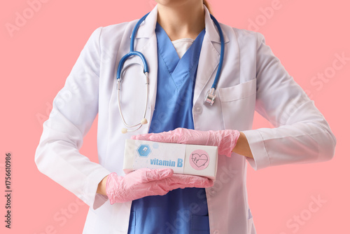 Female doctor with vitamin ...