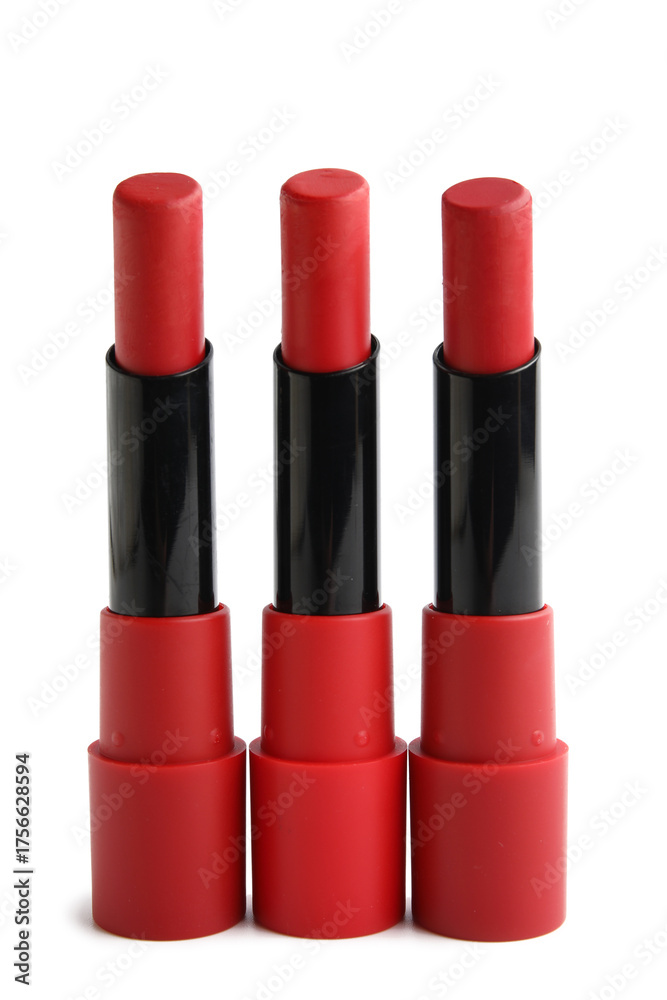 Obraz premium Red lipsticks on white background