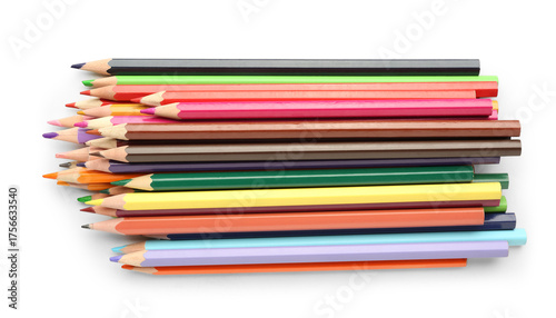 Many colorful pencils on wh...