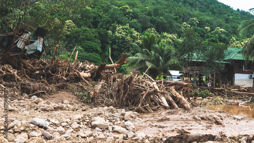 northern thailand floods land slips natural disaster homes damaged
