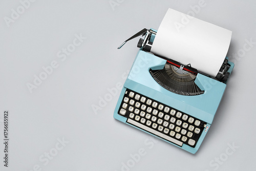 Vintage blue typewriter wit...