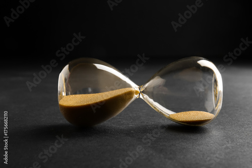 Hourglass with yellow cryst...