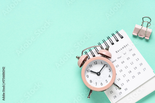 Calendar with alarm clock a...