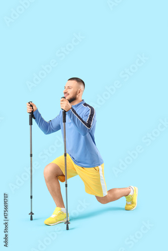 Sporty young man with walki...