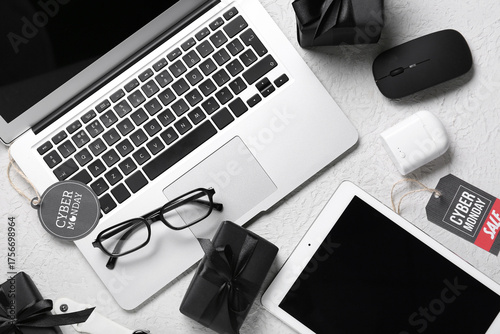 Gadgets with gifts on white...