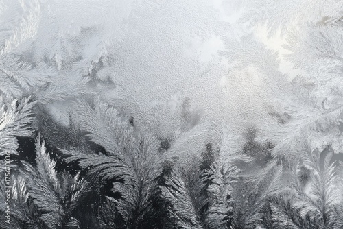 A frosty window with frosty leaves, creating a wintery and cold atmosphere. The silver ice glass shapes add a premium touch to the background, perfect for winter sale promotions.