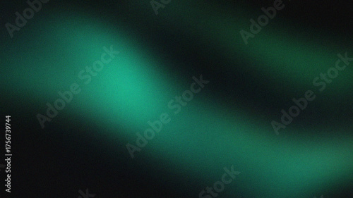 Abstract dark green background with a grainy texture and light effect, perfect for adding depth and visual interest to your designs and projects