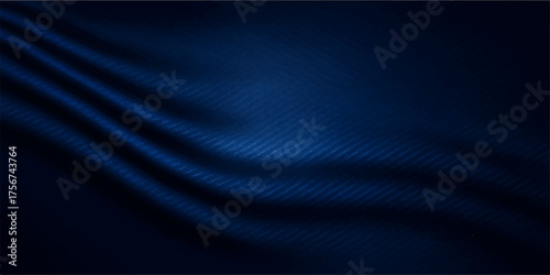 Dark blue silk satin fabric background with smooth flowing texture and wave pattern
