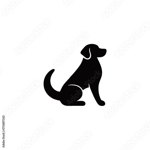 Sleek Black Silhouette of a Seated Dog with Curled Tail