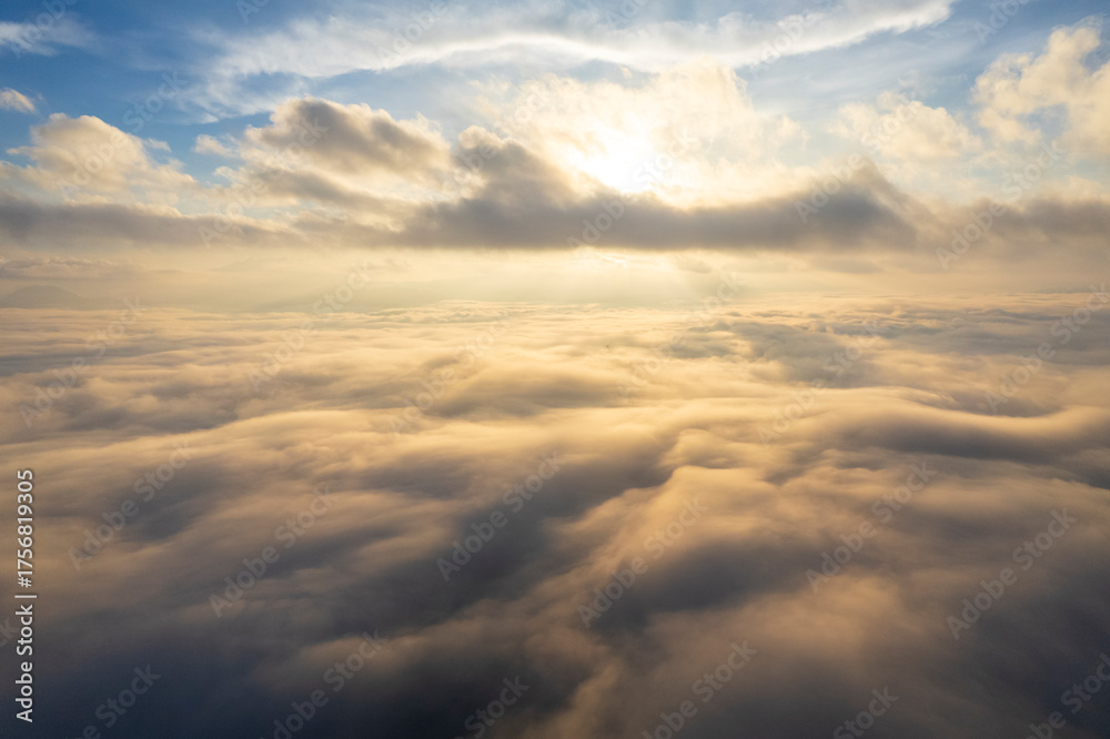 Fototapeta premium Landscape of Morning Mist with Mountain Layer. mountain ridge and clouds in rural jungle bush forest