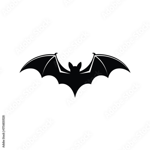 Silhouette of a black bat with outstretched wings against a white background