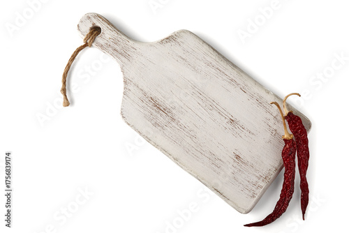 Painted white wooden board with hot red pepper pods isolated on white background