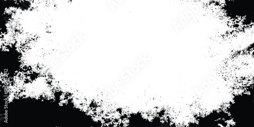 Grunge black and white distressed texture with scattered speckles and blotches for abstract background or overlay design.