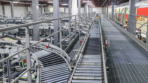 packing line in a logistics warehouse. conveyor belt in a modern production line