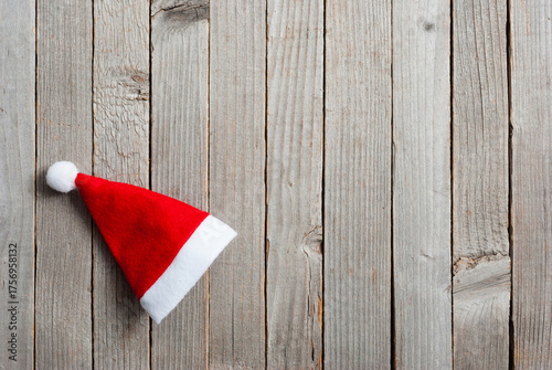santa hat on old wood table background