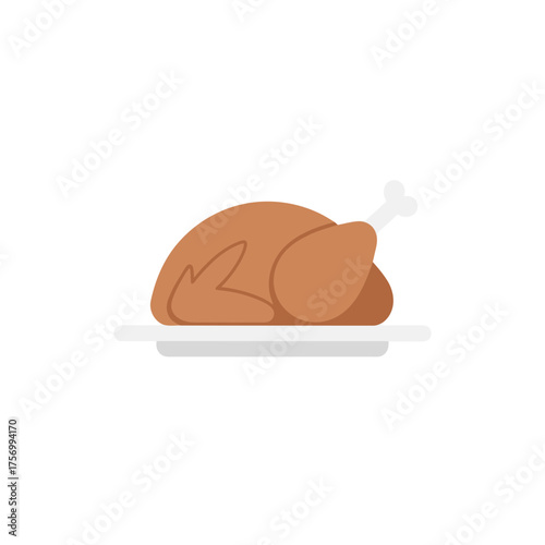 Roasted turkey on a white plate with a bone sticking out ready to be served for thanksgiving dinner