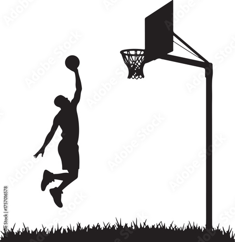 Black silhouette of a basketball player dunking a ball