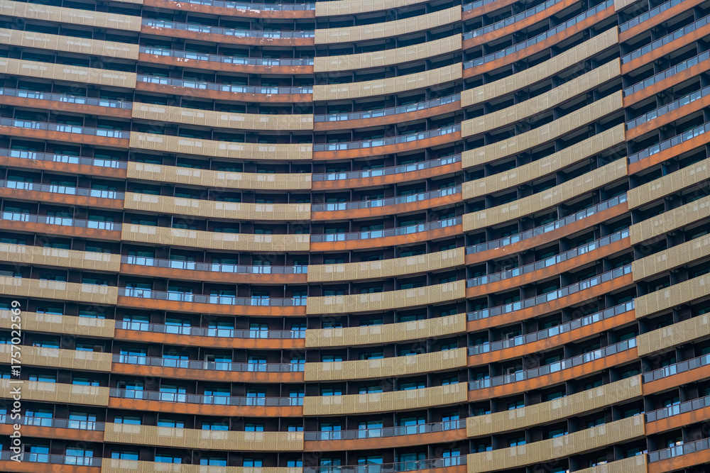Obraz premium modern apartment building with balconies and laundry drying in Shanghai, China