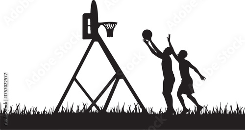Two people playing basketball on grass silhouette sport
