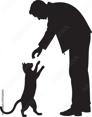 Man reaching down to a cat standing on hind legs silhouette