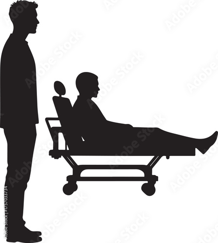 Silhouette of man standing next to patient on medical stretcher