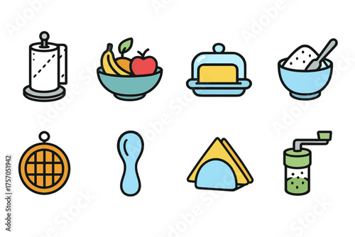 Kitchen items: paper towel, fruit bowl, butter dish, sugar bowl, waffle, spoon, napkins, spice shaker