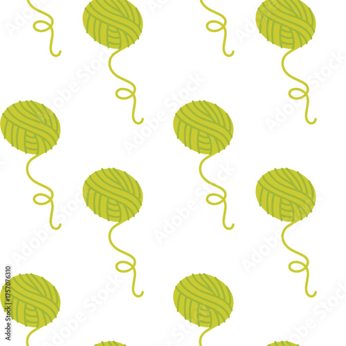 Decorative seamless pattern with green yarn balls. Cozy textile background for knitting crafts, handmade DIY projects and creative design.