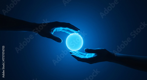 Two hands gently cupping a glowing blue light - Concept of World Diabetes Day  