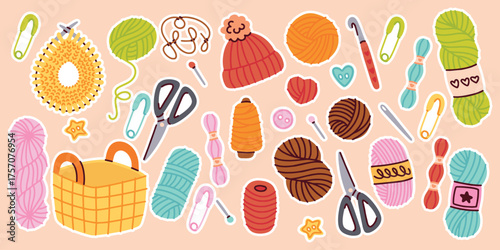 Yarn skeins, crochet hooks, scissors and sewing accessories arranged in bright composition for craft design themes.