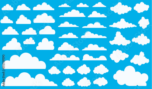 Large set of different stylized cartoon vector cloud shapes isolated on blue sky background