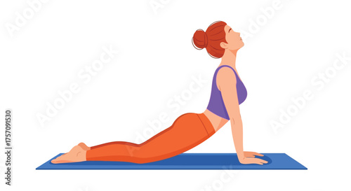 Woman practicing cobra pose yoga on a blue exercise mat