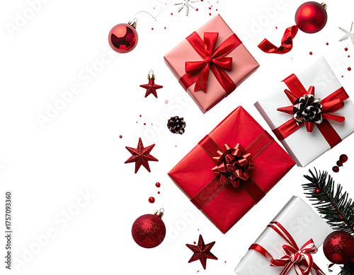 Overhead view of gift boxes, ornaments, and stars on a dark background; holiday