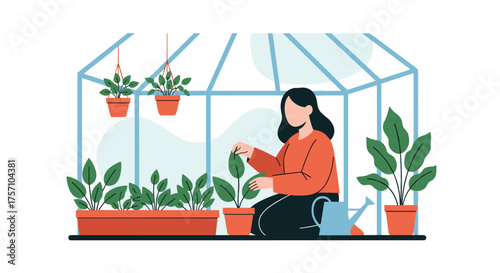 Woman Tending to Plants in a Greenhouse Cultivating Greenery