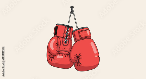 Classic red boxing gloves hanging from a hook, a powerful symbol of sports competition, fighting, and personal challenge