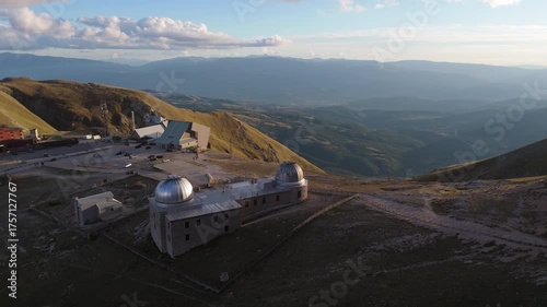 Aerial drone footage of the Astronomical Observatory of Abruzzo at Campo Imperatore, set against majestic mountain landscapes