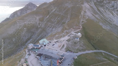 Aerial drone footage of the Astronomical Observatory of Abruzzo at Campo Imperatore, set against majestic mountain landscapes