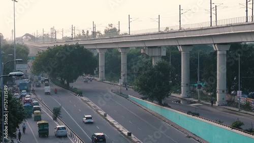 Punjabi Bagh Delhi road view with moving traffic and metro bridge
