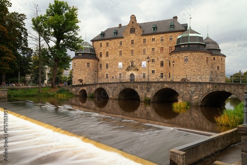 view of the historic Orebro Castle on the Svartan River in Sweden