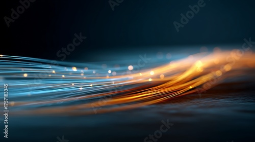 Abstract digital light trails and glowing particles on a dark background, evoking high speed fiber optic data transfer, network connectivity and futuristic communication technology