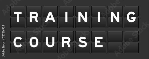 Black color analog flip board with word training course on gray background