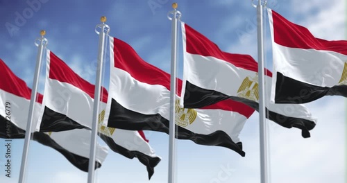 National flags of Egypt waving in the wind on a clear day