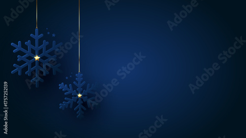 Christmas decorations. Blue snowflakes decorated gold shining stars. Navy winter background