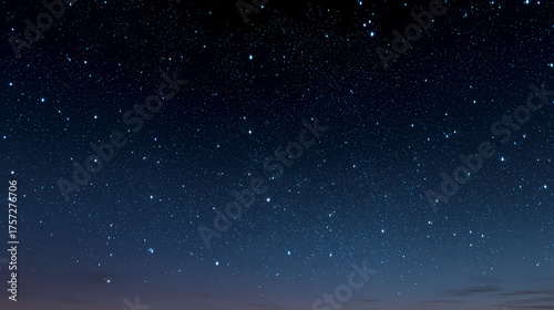 A mesmerizing night sky filled with twinkling stars, offering a sense of wonder and tranquility. The celestial canvas is speckled with countless points of light.