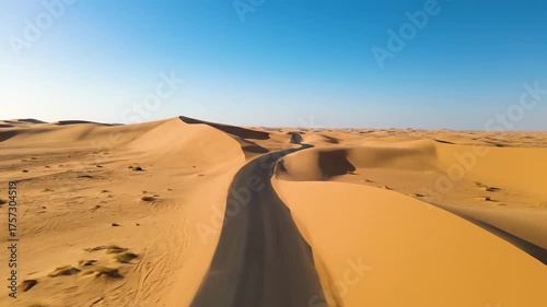 Wallpaper Mural Desert Road Adventure - A Scenic Journey Through the Sands. Torontodigital.ca