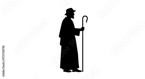 A striking silhouette of a traditional shepherd, wearing a hat and holding a staff, perfectly captures the spiritual essence of biblical narratives and Christmas nativity.