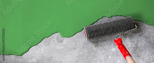 The concrete floor is emerald painted. Contractor will paint garage floor to accelerate home sale