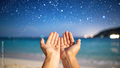 Hands Reaching Towards A Starry Night Sky Above Serene Ocean Beach
