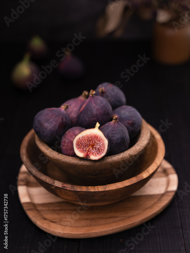 Half Sliced Fig in Wooden Bowl on Serving Plate with Rustic Decor