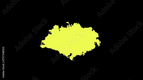 A yellow color visually striking video of ink drops spreading on a black background, ideal for artistic projects and enhancing visual storytelling .